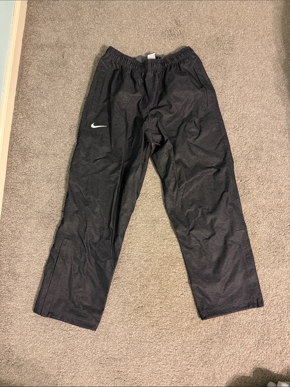 Nike Men's Black Athletic Sweatpants with White Swoosh